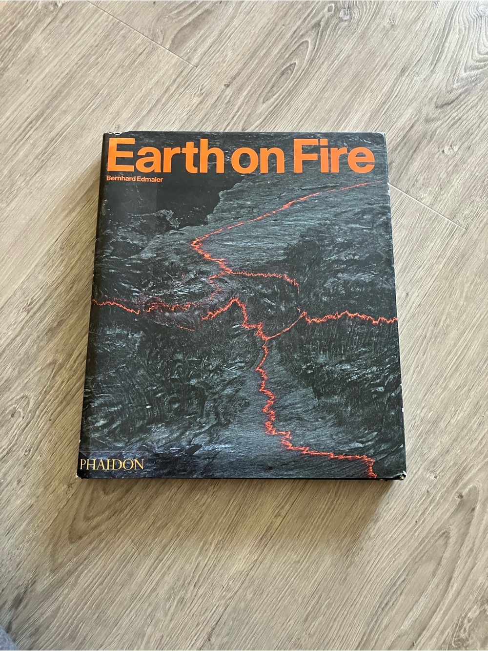2/$20 Earth on Fire Hardcover — Black with Orange Accents